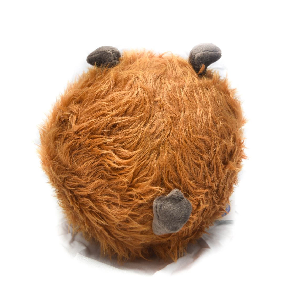 Plush toy resembling a fluffy brown creature with gray accents on a white background